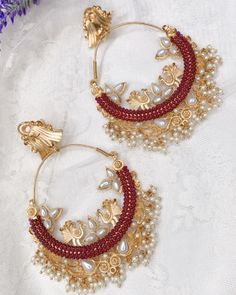 Designer hoppy style Bali earring. Micro gold plated with bead work. Light weight and color lasting gold plated. Medium yo big size. About 4 inch long and 3 inch wide. maroon and white pearl work. Gold Hoop Earrings With Pearl Drop For Festivals, Traditional Gold Hoop Earrings With Pearl Drop, Festive Gold Beaded Earrings With Pearl Drop, Red Chandbali Hoop Earrings With Latkans, Traditional Gold Beaded Earrings For Party, Traditional Festive Beaded Earrings With Pearl Drop, Festive Gold-plated Hoop Earrings, Traditional Festive Beaded Pearl Drop Earrings, Gold Hoop Earrings With Dangling Beads For Wedding