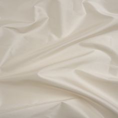 Made just for Mood, introducing a Silk Taffeta - Antique White - Premium Collection of the highest quality. Lightweight, with taffeta's trademark crispness and rustle, this material produces a soft sheen. Silk taffeta is perfect for special occasion wear. Available in 25+ attractive shades.  

Note: Dye lots are subject to change up to 10% in either direction. Ordering swatches is HIGHLY recommended for these products.