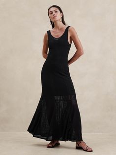 We selected one of our favorite all-season yarns for this maxi dress, employing a range of textured, open stitches to mimics the look and feel of crochet and pointelle styles.  Here, we added a removable knee-length slip, allowing you to dress it up or down as the occasion calls.  Fit & Flare: Fitted through the chest, empire waist, A-line skirt.  Sustainability: Made with LENZING™ ECOVERO™, a breathable fiber derived from certified renewable wood sources, produced using methods that reduce water impact and emissions by up to 50% compared to traditional viscose.  Sweetheart neckline.  Pull-on design.  Removable knee-length slip with adjustable slider straps.  Fit & Flare: Fitted through the chest, empire waist, A-line skirt.  Sleeveless.  Maxi length.  Model: Size S, 5'10" (178cm). Sling Sleeveless Dress Dark Black Dress Transmitbeauty, Black Crochet Dress, Lace Maxi, Lace Maxi Dress, Black Maxi Dress, Cocktail Dress Party, A Line Skirt, Crochet Dress, Empire Waist