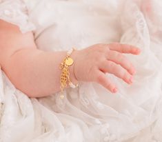 NEW! From our Timeless Collection, 14k gold-plated keepsake baptism gift "Baptism to Bride®" bracelet. This special keepsake will be a treasure that can be worn on her baptism day and then cherished again when she has her first communion, and becomes her "something old" on that special day when she becomes a bride. This is designed with 14K gold-plating (over .925 sterling silver) using all precious metals, high-quality freshwater pearls, high-end crystals, and is hand-beaded here in the USA. Th Adjustable Gold Rosary Bracelet For Baptism, Personalized Gold Jewelry For Baptism, Elegant Adjustable Bracelet For Baptism, Personalized Gold Rosary Bracelet For Birthday, Adjustable Gold Rosary Bracelet For Birthday, Elegant Adjustable Bracelets For Baptism, Elegant Hypoallergenic Rosary Bracelet For Baptism, Hypoallergenic Gold Bracelet For Birthday, Personalized Gold Name Bracelet For Baptism