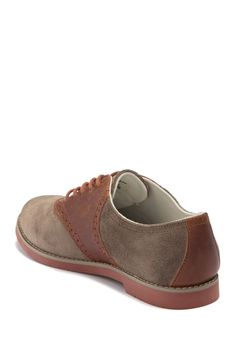 Brogued leather saddles soft suede on these classically styled derby shoes.Sizing: True to size. M=medium width. Round toe. Broguing details. Contrasting leather and suede construction. Lace-up. Memory foam insole. Welting detail. Approx. 0.75" heel. Imported Classic Brown Lace-up Shoes With Suede Lining, Classic Brown Suede Lace-up Shoes, Brown Oxford Leather Shoes With Rubber Heel Cap, Brown Leather Oxford Shoes With Rubber Heel Cap, Suede Brogue Oxfords Lace-up, Classic Lace-up Shoes With Suede Lining And Round Toe, Leather Footbed Cap Toe Oxfords, Brown Suede Lace-up Oxfords, Leather Oxford Shoes With Rubber Sole And Round Toe