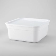 a white plastic container on a gray background