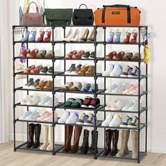 the shoe rack is holding many pairs of shoes