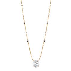 Discover the Deepika Mangalsutra, where timeless tradition meets modern sophistication. This elegant necklace features a vertically set brilliant oval certified lab-grown diamond in a fixed pendant, with options ranging in diamond size and grade. Crafted from luxurious 18k gold—available in yellow, white, or rose—it is accented with five evenly spaced black beads on each side of the chain and a diamond ranging in size and grade. The Deepika Mangalsutra transcends mere adornment; it's an embodime Deepika Mangalsutra, 18k Gold Chain, Elegant Necklace, Elegant Necklaces, Diamond Sizes, Lab Diamonds, Black Beads, 18k Rose Gold, Gold Chains