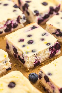 blueberry cheesecake squares are cut up and ready to be eaten