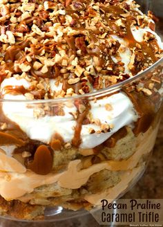 a dessert dish with pecans, cream and caramel drizzle on top