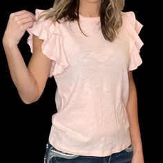 Add A Little Flattery To Your Style With This Super Cute, Flirty, Pale Pink Tee! This Tee Features A Little Romantic Flouncy Ruffle On Its Sleeve. Love Them Or Hate Them, Ruffles Are In! Description: Self: 100% Cotton Total Length: 25" | Bust 17 1/2" | Shoulder 13" Trendy Ruffle Sleeve Tops For Summer, Cotton T-shirt With Ruffles And Flutter Sleeves, Cotton Ruffle T-shirt With Flutter Sleeves, Casual Cotton Short Sleeve Top With Ruffle, Casual Cotton Ruffle Sleeve Top, Casual Cotton Short Sleeve Top With Ruffle Sleeve, Trendy Ruffle Sleeve Tops For Day Out, Spring Cotton Short Sleeve Top With Ruffle Sleeves, Casual Ruffle Sleeve T-shirt For Summer