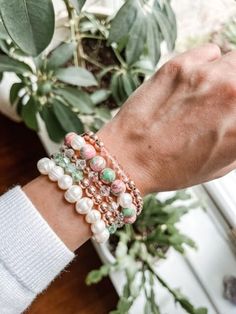 "Say 'Hello' to 🏝️warmer weather and ☀️brighter days with this Pink Jade Bracelet stack! Wear this pink and green rain flower jade bracelet alone or layer this gemstone for a fresh look that's sure to make a statement. Choose from a unique combination of gemstones, white pearls, rose gold hematite beads, Czech crystals and faceted glass beads that sparkle in the light. This chunky bead bracelet is perfect for both casual and formal occasions. It's packaged ready-to-gift or treat yourself to the Flower Jade, Pink Jade, Brighter Days, No Rain No Flowers, Chunky Beads, Jade Bracelet, Czech Crystal, Hematite Beads, Pretty Bracelets