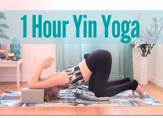 a woman laying on the floor in front of a yoga mat with text reading 1 hour yin yoga