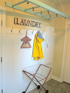 the laundry room is clean and ready to be used as a storage area for clothes