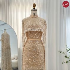 Indulge in the luxurious design of Dreamy Vow's Champagne Evening Dress. Adorned with pearls and a cape, this stunning Arabic-style gown will make you feel like royalty at any wedding or party. The mermaid silhouette is sure to flatter and wow, making it a must-have for any special occasion. Arabic Women, Yellow Evening Dresses, Mob Dress, Sequin Cape, Grey Evening Dresses, Champagne Evening Dress, Gold Evening Dresses, Green Evening Dress, Arabic Style