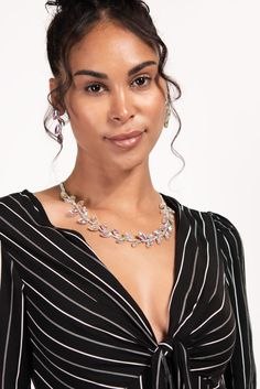 Add a touch of sparkle to your look with this elegant rhinestone leaf necklace and earring set. The necklace features a delicate chain adorned with sparkling leaves, while the matching earrings complete the set. Perfect for a special occasion or to add some glamour to your everyday look. This necklace and earring set is made with high-quality materials and will become a favorite in your jewelry collection. Make a statement with this beautiful rhinestone leaf set. SizeLength: 20.5 in (52.07 cm)Ex Pearl Shop, Delicate Chain, Necklace And Earring Set, Pearl Set, Leaf Necklace, Necklace Earring Set, Pearl Ring, Matching Earrings, Fascinator