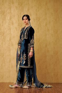 Blue Silk Velvet Punjabi Suit: Luxurious Ethnic Wear for Women – Panache Haute Couture Simple Velvet Suit Design, Traditional Festive Suits With Intricate Embroidery, Traditional Sharara With Intricate Embroidery For Formal Events, Traditional Sharara With Intricate Embroidery For Formal Occasions, Traditional Embroidered Sharara For Formal Occasions, Traditional Festive Suits With Dupatta, Formal Festive Palazzo Set With Pallu, Festive Suits With Resham Embroidery For Diwali, Bollywood Style Suits For Eid