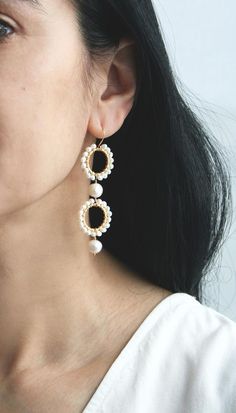 ★★★A modern take on pearls while also keeping it traditional. I've mixed small and large pearls for a unique look. These statement earrings will be a showstopper on your wedding day.+ Freshwater Pearls. 14K Gold Fill Ear Wire. 14K Gold Plate Circles.+ Length: 2.75 inches.+ Earrings take 1 business day to make.+ Your jewelry will come in a jewelry box, tied with a ribbon.➤➤ Have a question about this product, reach out to me here ➙ https://www.etsy.com/conversations/new?with_id=9057464&referr Elegant Teardrop Beaded Earrings For Wedding, Akoya Pearl Round Earrings For Wedding, Pearl White Drop Earrings, Pearl White Pearl Drop Earrings, Pearl Drop Akoya Pearl Earrings For Wedding, Akoya Pearl Dangle Earrings For Wedding, Akoya Pearl Drop Earrings For Wedding, White Pearl Chain Bridal Earrings For Anniversary, White Bridal Earrings With Pearl Chain For Anniversary