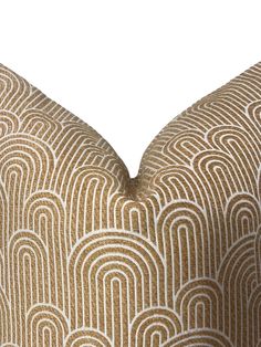 a close up view of the back of a pillow with an art deco design on it