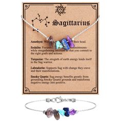 the zodiac sign necklace and bracelet set is shown in front of an astrological card