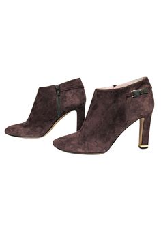 Now these are a Autumnal staple that you have to have! Made with soft suede, these heeled booties are the perfect addition to any sweater weather ensemble! Slip on your favorite chunky cardigan and high-waisted jeans for a comfortable and timeless combo. Size 10 Suede upper Rounded toe Side zipper closure Leather footbed with minimal wear Gold-toned bow and heel accent Leather sole with wear Heel 4" Fall Booties With Stacked Heel, Brown Suede Booties For Fall, Winter Suede Booties Medium Width, Suede Lined Ankle Boot Heels For Fall, Fall Suede Ankle-high Booties, Elegant Suede Booties For Winter, Elegant Winter Suede Booties, Winter Workwear Ankle Boot Heels, Fall Suede Ankle Boot Heels