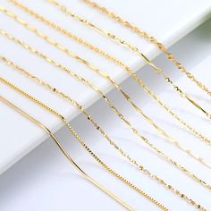 SPECIFICATIONSBrand Name: HOYONItem Weight: 0.01gOrigin: Mainland ChinaCertificate: YESMain Stone: noneMetals Type: NoneGender: WomenNecklace Type: Chains NecklacesOccasion: AnniversaryChain Type: Snake ChainItem Type: NECKLACESCertificate Type: Third Party AppraisalStyle: TRENDYSide Stone: NoneCertificate Number: GDTCModel Number: K gold plated chainis_customized: YesShape\pattern: StarFine or Fashion: FineType: chain necklacePack: Independent packaging with jewelry boxSuitable for gift-giving Bone Necklace, Color Necklace, Cross Chain, Laura Geller, Jewelry Making Charms, Birthday Jewelry Gift, Cow Boy, Copper Necklace, Yellow Gold Chain