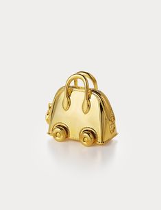 Inspired by Hermes Bolide On Wheels Bag Charm, Aelysee has meticulously crafted the Mini Bolide On Wheels Bag Charm, incorporating unique design elements. The charm features a separate clasp and chain, allowing you to customize it effortlessly with any of your handbags. Electroplated brass Charm size - 30 x 18.3 x 28.8mm Total weight 38g One year warranty Hermes Charm, Christmas Tree Bag, Hermes Bolide, Tree Bag, Christmas Tree Collection, Gold Christmas Tree, Hermes Bag, Brass Charms, Classic Gold