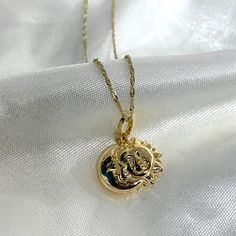 14K Gold Sun & Moon Charm Pendant With 0.9MM Singapore Chain Necklace Real Gold  Necklace Charm Celestial Solid Gold Necklace ✅ PENDANT SPECIFICATIONS:  * Height: 0.51 in. (13 MM) * Width: 0.59 in. (15 MM) * Average Weight: 1.32 gr. ✅ CHAIN SPECIFICATIONS:  * Clasp: Spring-Ring  * Width: 0.9 MM ➤ Length: 16 inches   Avg Weight: 0.64 ➤ Length: 18 inches   Avg Weight: 0.71 ➤ Length: 20 inches   Avg Weight: 0.76 ➤ Length: 22 inches   Avg Weight: 0.83 ✅SHIPPING CONTENTS: -14K Gold Pendant & Chain -J Necklace Real Gold, Real Gold Necklace, Gold Chain With Pendant, Solid Gold Necklace, Gold Sun, Gold Charm Necklace, Average Weight, Jewelry Lookbook, Necklace Charm