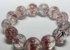 Material: super seven quartz beads  size :Approx 14mm (Due to different measurement methods and measuring instruments, there may be a deviation of about 0.5mm. If you mind, please do not buy it. Thank you for your understanding.)   quantity: 1 strands 6mm approx 29 pcs one strands 7mm approx25 pcs one strands 8mm approx 22 pcs one strands 9mm approx 21pcs one strands 10mm approx 19 pcs one strands 11mm approx 18pcs one strands 12mm approx 16 pcs one strands 13mm approx 16 pcs one strands 14mm ap Quartz Beads, Healing Stone, Handmade Bracelet, Healing Stones, Handmade Bracelets, Beaded Bracelet, Gifts For Kids, Etsy Accessories, Beaded Bracelets