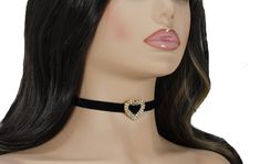 Soft to touch and pretty looking white velvet choker collar with a rhinestone silver plated or gold plated heart pendant charm. Choker necklace length is 33cm = 13 inch with adjustable 6 cm = 2 3/8inches chain. Velvet 10mm = 0.39 inches wide. Rhinestone heart about 2.6x2.4cm = 1.02x0.94 inches. Please, contact me if you need different length of the necklace. More chokers you can find here https://www.etsy.com/shop/lorArtstudio/edit?ref=seller-platform-mcnav&section_id=22503134 Thank you for stopping by my shop! I hope you have found something that you love!   Add my shop to your favorites and you'll get notifications about new jewelry and promotions Velvet Necklace, Charm Choker Necklace, Gold Heart Pendant, Black Velvet Choker, Necklace Collar, Heart Pendant Gold, Velvet Choker, White Velvet, Valentines Day Gifts For Her