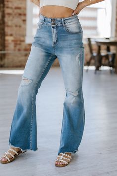 Experience the perfect combination of comfort and style with our Ayah Light Wash Flare Jeans. Made from high-quality denim, these jeans provide a flattering, slimming fit while the flare design adds a touch of trendy flair. Elevate your wardrobe and make a statement with these must-have jeans! Material:75% Cotton + 23% Polyester + 2% Elastane Model info; Models are 5'7", Size 2, wearing smalls High Rise Denim Flares For Fall, Denim Blue Straight Leg Flares For Fall, Fall Denim Blue Straight Leg Flares, Non-stretch Light Wash Flare Jeans With Five Pockets, High Rise Blue Flares With Five Pockets, Denim Blue Flare Jeans With Five Pockets, Non-stretch Denim Flares For Fall, High Rise Dark Wash Denim Flares, High Rise Denim Flares