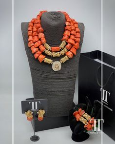 Description Our stunning Coral Bead Necklace and African pendant set are a perfect choice for anyone searching for a unique and eye-catching piece of jewellery. This ethnic necklace is ideal for fashion-forward individuals, who want to add a touch of elegance to their ensemble. Crafted from high-quality coral beads, this African beaded necklace features an intricate design that is a perfect reflection of the rich African cultures and traditions. With this fabulous necklace, you're sure to stand Elegant Orange Red Coral Beads, Elegant Coral Beads, Elegant Red Coral Gemstone Beads, Elegant Wedding Beads With Stones, Elegant Coral Beaded Necklaces With Large Beads, Elegant Red Coral Beads For Jewelry Making, Elegant Orange Jewelry With Stones, Traditional Red Coral Beaded Necklaces For Wedding, Elegant Beaded Necklaces For Traditional Ceremonies