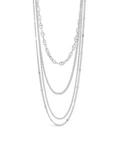 Behold fashion royalty: the Lulu Layered Necklace! Featuring a statement mix of chains, this bad boy will rock every neckline like a king or queen. So if you want to be bold and get noticed, Lulu's the one! Materials: 14K gold or rhodium plated brass Features: Measures 14-19" with 2" extender, 0.35" width, Lead & Nickel free, lobster clasp Trendy Necklace With Silver Chain, Multi-strand Silver Chain Necklace, Silver Multi-strand Metal Chain Necklace, Silver Chain Link Layered Necklace, Edgy Necklace With Adjustable Chain Link, Trendy Silver Chain Necklace, Chic Silver Layered Chain Necklace, Multi-strand Metal Necklace With Chunky Chain, Chunky Chain Layered Metal Necklace For Party