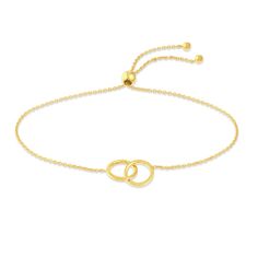 A meaningful interlocking circles shimmer elegantly in the center of this fabulous women's bolo bracelet. Fashioned in 14K yellow gold, the cable chain secures in place with a bolo clasp. Modern Gold Bracelet With Adjustable Oval Link, Modern Adjustable Gold Bracelet With Oval Links, Modern Adjustable Oval Link Gold Bracelet, Timeless Adjustable Gold Bracelet With Solid Link, Adjustable Polished Yellow Gold Bracelet, Elegant Gold Bracelet With Adjustable Length, Adjustable Gold Chain Bracelet With Polished Finish, Modern Gold Jewelry With Adjustable Clasp, Elegant Gold Bracelets With Adjustable Clasp