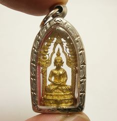 Buddha Niruntarai Amulet Pendant Size : 2.0 x 4.1 cm. (Approx.) This is the image of Buddha Niruntarai. This amulet was made to bring protection and bless the owner to cross over all obstacle. Magician Monk of Wat MaiKratoomlom created and blessed this amulet  for using as  Strong Life Protection ,Goodness , Good Luck , Success Amulet. It will make a fantastic gift for someone special or for a collector of Asian antiques.Keep it with you for Successful Power or keep it in your house .This is a f Rectangular Spiritual Good Luck Jewelry, Spiritual Rectangular Good Luck Jewelry, Spiritual Rectangular Jewelry For Good Luck, Rectangular Spiritual Jewelry For Good Luck, Carved Amulet For Good Luck, Wealth Attraction, Talisman Pendant, Lord Buddha, Asian Antiques