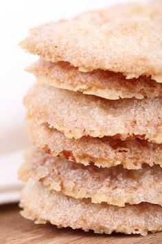 a stack of cookies sitting on top of a wooden table