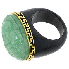 Elevate your ensemble with the Kwan Collections Gold-Plated Floral Carved Jade Ring. This exquisite piece showcases a masterful blend of artistry and elegance, perfect for those who appreciate unique jewelry.

- Size: 7
- Color: Gold
- Material: Yellow gold-plated sterling silver
- Gender: Female
- Features an oval-shaped green jade, intricately carved with a floral design, set atop a charcoal jade base
- Dimensions of the ring top: Approx. 3/4"L x 1"W x 9/16"H; Shank width: 5/16"W
- Design deta Exquisite Jade Jewelry For Formal Occasions, Luxury Carved Jewelry For Formal Occasions, Luxury Intaglio Rings For Anniversary, Exquisite Carved Jewelry For Anniversary, Luxury Carved Jewelry For Anniversary, Luxury Green Intaglio Rings, Art Deco Carved Round Jewelry, Luxury Collectible Rings, Formal Jade Gemstone Jewelry