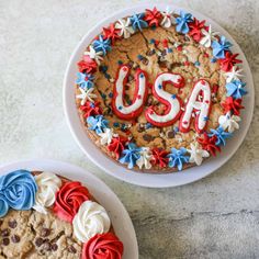 two cakes decorated to look like usa and cookies