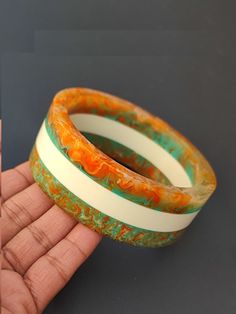 "you will receive 1 piece of Handmade resin bangle Bracelet Colorful Resin Stacking Bracelet  Modern Trendy jewelry Gift For Women Inner diameter= 2.6\" approx. Material: Resin Quantity: 1 Piece Thank you very much for visiting! Any questions, please feel free to contact us. Discount for bulk provide." Retro Handmade Bangle Jewelry, White Handmade Bohemian Bangle, Handmade Retro Bangle Bracelet, Handmade Orange Cuff Bracelet Bangle, Handmade Orange Bangle Cuff Bracelet, Handmade Orange Cuff Bangle, Handmade Artistic Bangle As Gift, Artistic Handmade Bangle As Gift, Handmade Retro Bracelets As Gift