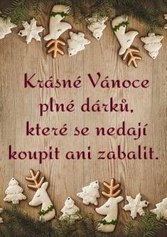 a wooden sign with christmas decorations and words on the front saying, kaasne vanoce plie daki kere se nedi kopit ani