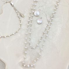 These elegant earrings are sure to make any bride look absolutely stunning. This classic pair is perfect for my pearl loving women! The earrings could work with either the bride, bridesmaids, or mother of the bride/groom styles. Give yourself or your loved one a piece that will be an everlasting memory of this new chapter in life. Length: 1" Coin Pearl Earrings, Wearing Pearls, Rosary Jewelry, Pearl Rosary, Rosary Bracelet, Coin Pearls, Bride Look, Elegant Earrings, Classic Elegance