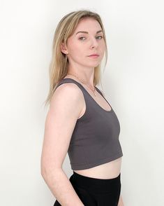 TO TRANSFORM: Wear with the high neckline in the front or flip it around and bring the scoop neck to the front and show a little chest. Sparrow crop is a cool, cropped version of our Sparrow top. PRODUCT DETAILS: - 60% Rayon, 33% Nylon, 7% Lycra- Moisture wicking and four-way stretch - Machine washable and dryer safe - MADE IN USA - Model: Talia is wearing a size small View our shipping and returns policy We'd love to hear from you! Email hello@paridaez.com with any questions. Fitted Crop Top With Built-in Bra And Scoop Back, Fitted Sports Bra With Scoop Back, Bra-friendly Scoop Neck Crop Top, Solid Scoop Neck Crop Top, Bra Friendly, Casual Tops With Bra-friendly Scoop Back, Scoop Neck Seamless Crop Top For Yoga, Casual Gray Crop Top With Built-in Bra, Yoga Scoop Neck Seamless Crop Top, Chic Fitted Gray Crop Top