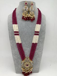 AD Red Stone Red Beads Peacock Pendent Pink White Hydro Beads Long Mala Necklace Length : 22 Inches; Earring Length : 2.5 Inches Approx Festive Jewelry Sets With Dangling Round Beads, Red Beaded Pearl Necklace For Party, Red Beaded Temple Jewelry Sets, Festive Red Jewelry Sets With Polished Beads, Festive Red Polished Bead Jewelry Sets, Festive Long Colorful Beads Necklace, Red Temple Jewelry Bridal Necklace With Polished Beads, Red Beaded Chain Necklace For Wedding, Festive Long Necklace With Colorful Beads