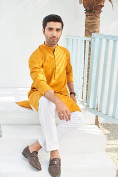 Color: Yellow Fabric: Organic Cotton  Includes:  -Kurta -Trouser -Kurta Trouser:  Breathable Soft Cotton with good fall.  -Mandarin collar  -Full Sleeves  -This is a 2 Piece Stitched Outfit Customize Stitching Available