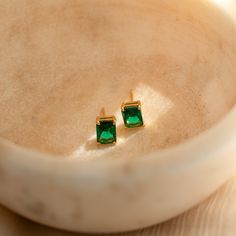 Everything about our Emerald Cut Birthstone Studs make them a must-have staple for your collection. From its personalized touch to its minimalist style — these gemstone earrings coordinate effortlessly with any outfit. Wear them as everyday earrings to work and play, or pair them with a fancier outfit for a night out! They also make special personalized gifts for all the women in your life. Makes sense why they're such a crowd favorite! Material: High Quality Solid 925 Sterling Silver Finish: 18 Minimalist Birthstone Earrings, Minimalist Yellow Gold Earrings For May Birthstone, Minimalist Birthstone Earrings For Everyday, Minimalist Yellow Gold May Birthstone Earrings, Minimalist Everyday Earrings With Birthstone, Minimalist 14k Gold May Birthstone Earrings, Dainty Birthstone Earrings For Everyday, Dainty Everyday Gemstone Earrings, Minimalist May Birthstone Earrings