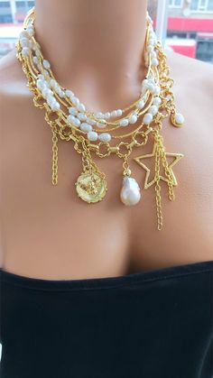 The handmade multistrand necklace has been designed with 5 row of fresh water pearl and 1 row of 14 k gold plated chain. Pearl Charm Necklace, Necklaces Handmade, Jewelry Pearl, Charm Necklaces, Fresh Water Pearl, Pearl Charms, Multi Strand Necklace, Hand Made Jewelry, Gold Plated Chains