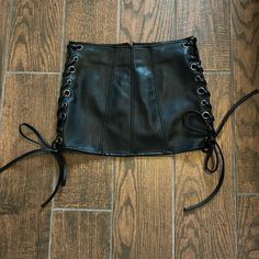 Faux Leather Mini Skirt N/W Tags. Lace Up Sides And Zipper Back. Faux Leather Mini Skirt, Leather Mini Skirt, Leather Mini, Leather Skirt, Mini Skirt, Womens Skirt, Mini Skirts, Faux Leather, Lace Up