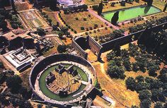 an aerial view of the ruins and gardens