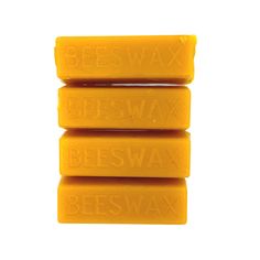 three beeswax bar soaps stacked on top of each other with the words beeswax printed on them