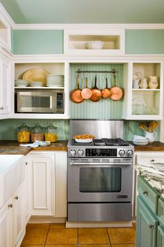 the kitchen is clean and ready to be used as a cook's space for cooking