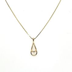 "Vintage 14k Yellow Gold Tear Drop Gold Pendant with Diamond Necklace. The tear drop pendant measures about 1\" long and .3\" wide. There is one small diamond in the center that weighs about .03ct. The length of the necklace is 17 13/16 inches long. The weight of the necklace is 4.33g." Drop Pendant, Gold Pendant, Diamond Necklace, Necklace Etsy, Jewelry Necklace Pendant, Yellow Gold, Jewelry Necklaces, Yellow, Pendant Necklace