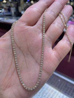 "Beautiful Genuine Diamond Necklace. Perfect piece for a bit of bling around the neck. Wear on its own or layer with other necklaces. Excellent craftsmanship, the diamonds are set nice and smooth. Simple and stylish necklace to wear with everything. 14K Chain has extra loop so you can wear at 18\", 17\", or 16\" lengths. About 2.5mm width. Only yellow gold available now. Genuine earth mined round brilliant cut diamonds Total weight: 1.52 carats Clarity: SI/I Color: G Solid 14K white (sold out) 1 Gold Tennis Necklace With 17 Jewels As A Gift, Classic Cubic Zirconia Necklace With Bling, Classic Cubic Zirconia Necklaces With Bling, Diamond Tennis Necklace With Rhinestones For Gift, Gold Tennis Necklace With Prong Setting As Gift, Gold Crystal Jewelry With Prong Setting, Classic Diamond Necklace With Rhinestones For Gift, Diamond Bling Necklaces For Anniversary, Bling Diamond Necklace For Anniversary