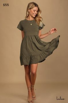 You'll be looking beyond precious in the Lulus Sweetest Style Olive Green Tiered Babydoll Dress! Lightweight stretch knit creates this super comfy dress with a crew neckline, short fluttery sleeves, and a relaxed bodice. A loosely-fitted waist tops the ruffle-trimmed mini skirt (with side seam pockets) that finishes off the babydoll silhouette. Pull-on design. Fit: This garment fits true to size. Length: Mid-thigh. Size medium measures 34.5" from shoulder to hem. Bust: Great for any cup size. Wa Cute Dresses Casual Modest Short, Juniors Dresses Casual, Sun Dresses Casual Short, Womens Sun Dresses Casual, Cute Fall Church Dresses, Babydoll Tiered Dress, Casual Dresses Fall, Olive Green Sundress, Farmhouse Fashion Clothes