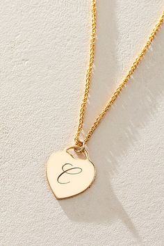 Just as effortless as it is elegant, this stunning necklace features a heart-shaped pendant with gorgeous cursive engraved initial for the ideal finishing touch. * 14k Gold Filled wheat chain * Personalized, laser engraved, 14k Gold Filled 12x14mm heart charm * Length: 18" * 5 days of production | Set & Stones Personalized Alice Necklace at Free People in Gold Jewelry Engraving, Engraved Initials, Monogram Jewelry, Meaningful Jewelry, Accessories Jewelry Necklace, Stunning Necklace, Initial Necklace, Gifts For Teens, Laser Engraved